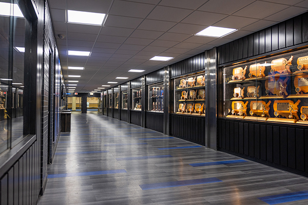 Chris and Julie Spray Family Hall of Champions Concession Hallway (East wall - Trophy cases)